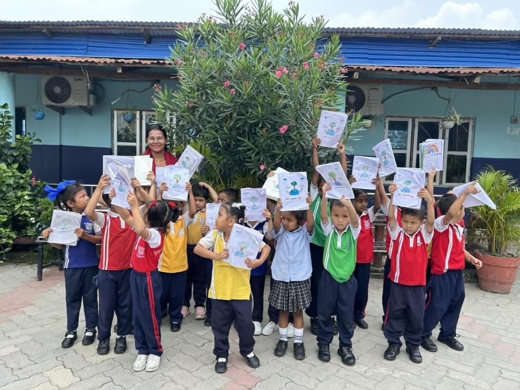 Junior students with their artwork